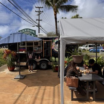 Aloha Liege Waffles & Espresso - View of food truck and seating - Food Trucks Near Me - Lihue, Hawaii Aloha Liege Waffles & Espresso - View of food truck and seating - Food Trucks Near Me - Lihue, Hawaii