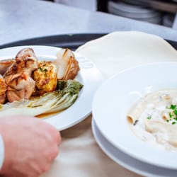 Careme's Restaurant - Ravioli Entree and Poussin ready to be served
