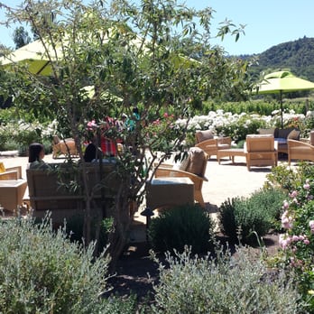 Brix - Comfortable seating and umbrellas to enjoy a refreshing drink and the view of the vineyards - New American Near Me - Napa, California