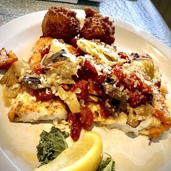 Harry's Old Place - Corvina Monterey: Very light and fresh with crazy good hush puppies - Seafood Near Me - Winter Haven, Florida Harry's Old Place - Corvina Monterey: Very light and fresh with crazy good hush puppies - Seafood Near Me - Winter Haven, Florida