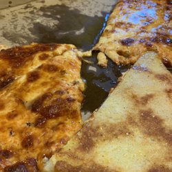 So much oil we had to turn some pizza over to let gravity take it off.