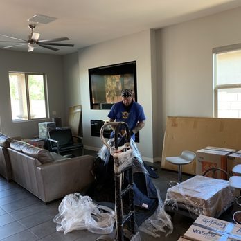 Camelback Moving - Movers setting up our couch so we had a place to sit. - Movers Near Me - Phoenix, Arizona