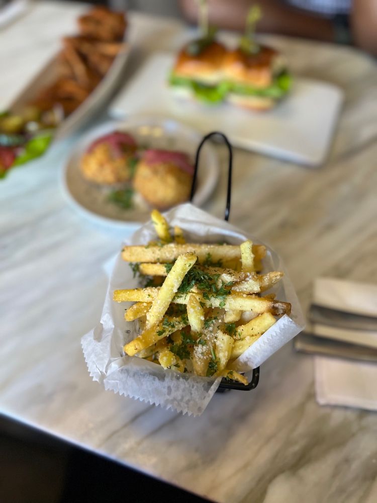 Photo of Lucky’s Cocktail Lounge - Brooklyn, NY, United States. Truffle fries