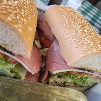 Capri Deli - Roast beef sandwich with a side of pickle.  yummo - Delis Near Me - Covina, California