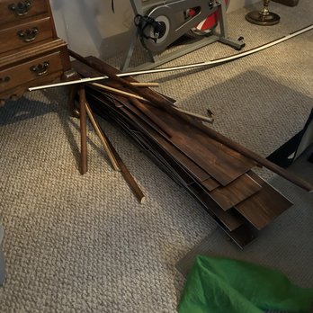 Empire Today - Another photo of our bran new flooring stacked and left in our dining room for 2 months. - Carpet Installation Near Me