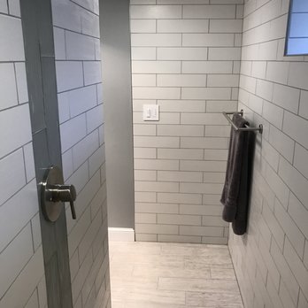 Stella Construction & Home Services - Thermostatic valve located at shower threshold - General Contractors Near Me