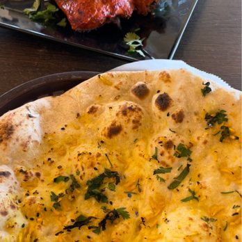Pakwan Restaurant - Garlic naan and tandoori chicken leg - Indian Near Me - Fremont, California