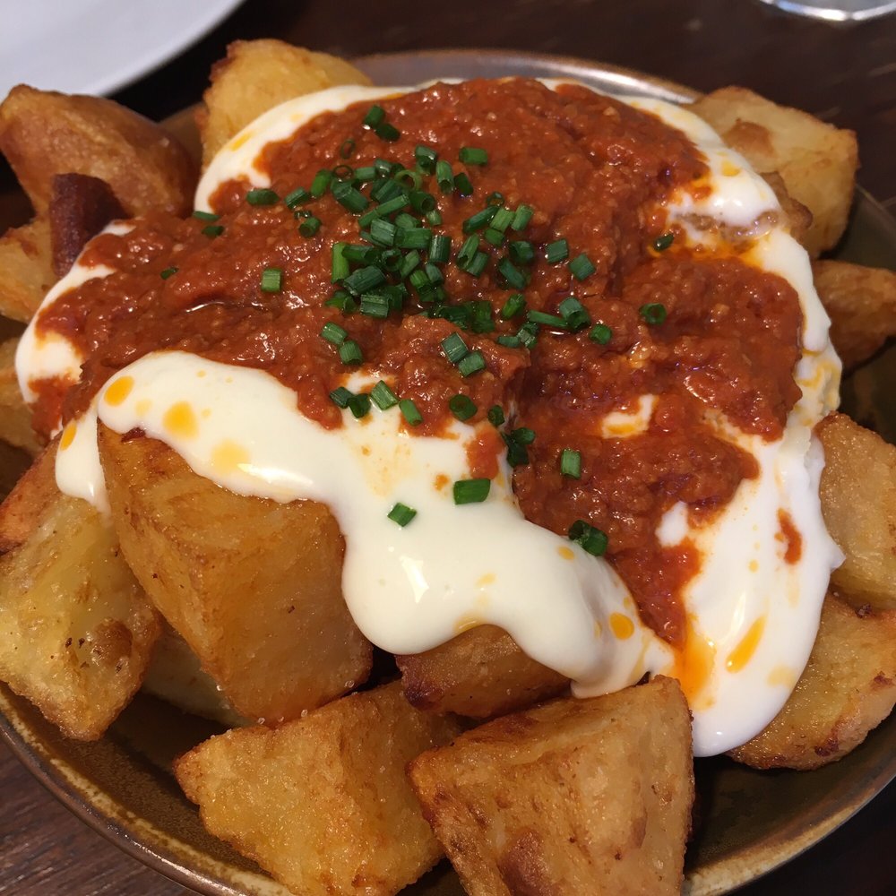 Casa Angela - Patatas bravas. Really good here! - Tapas Bars Near Me - Barcelona, B