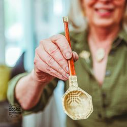 Boulder Metalsmithing Association - Student shows off a serving spoon made in our studio using brass and wood!