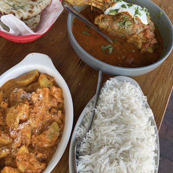 Radhika Modern Indian - Naan, lamb shank, sautéed squash, and rice. - Indian Near Me - South Pasadena, California Radhika Modern Indian - Naan, lamb shank, sautéed squash, and rice. - Indian Near Me - South Pasadena, California