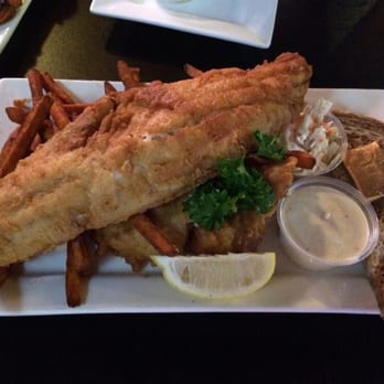 Baldwin Street Grille - Huge piece of perch with some cod underneath. Sweet potato fries also very delicious! - Bars Near Me - Madison, Wisconsin Baldwin Street Grille - Huge piece of perch with some cod underneath. Sweet potato fries also very delicious! - Bars Near Me - Madison, Wisconsin
