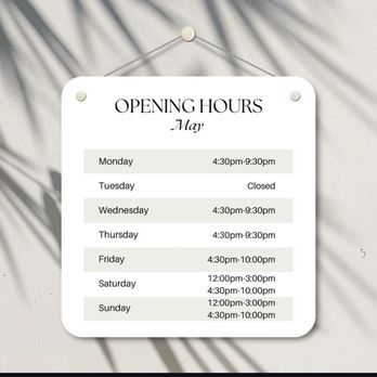 Tsuruya - They have an IG - A printed sign with a white background and black text displays the May opening hours for Tsuruya, a ramen restaurant in Berkeley, California. The sign is attached to a wall with a shadow pattern cast across it, and it lists specific days and times, including closures on Tuesday and details for Saturday and Sunday. The sign is designed with a simple, clean layout, indicating the restaurant's schedule for the month. - Ramen Near Me - Berkeley, California