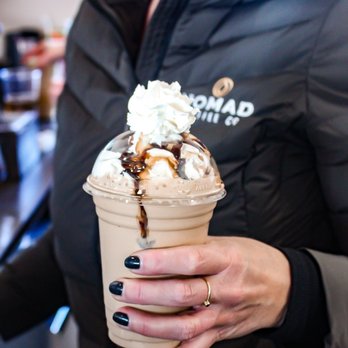 Nomad Coffee - a woman holding a cup of coffee - Coffee & Tea Near Me - Oldtown, Idaho Nomad Coffee - a woman holding a cup of coffee - Coffee & Tea Near Me - Oldtown, Idaho