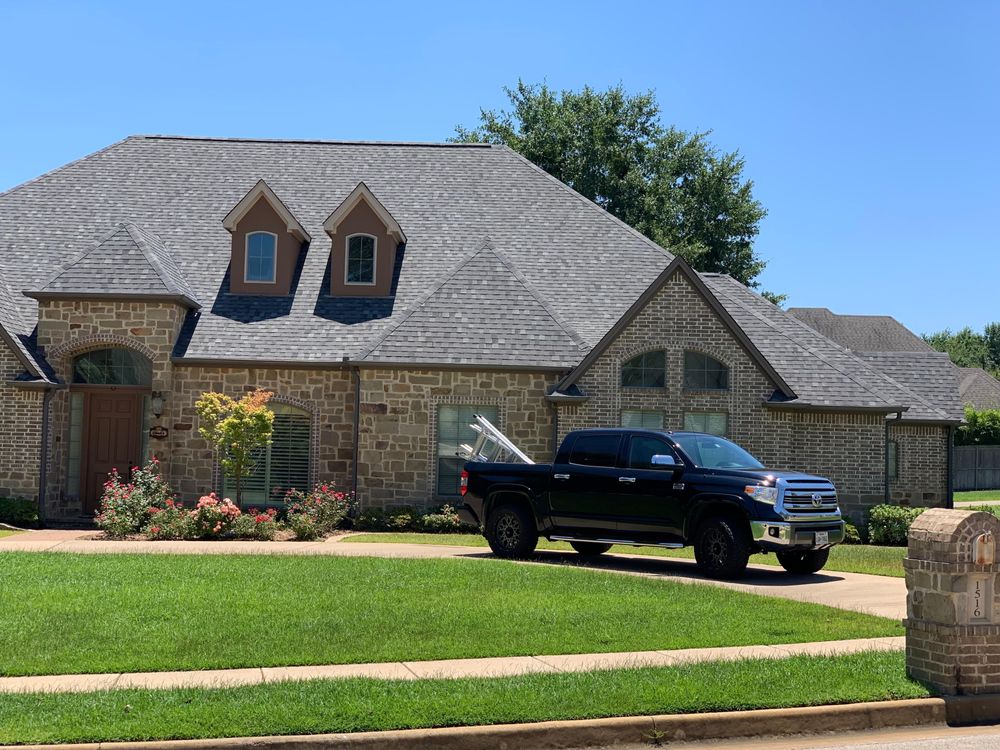 Slide of Yosemite Roofing Longview TX