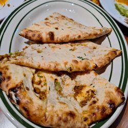 India's Tandoori - Who serves food that looks like you dropped it and kicked it?