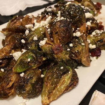 The 49th Food & Spirits - Brussels sprouts with the apple vinaigrette sauce. - Burgers Near Me - Denver, Colorado