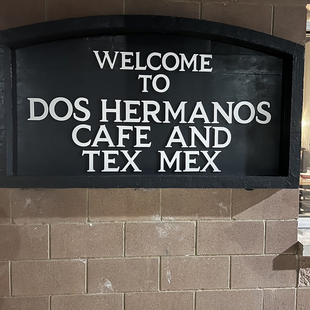 Dos Hermanos - a sign for a mexican restaurant - Bars Near Me - Cedar Park, Texas