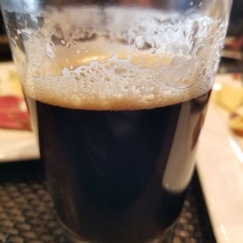 Rodizio Grill - Roughly half of the bottle of Xingu Black ($6), a surprisingly delicious beer - Brazilian Near Me - Henderson, Nevada Rodizio Grill - Roughly half of the bottle of Xingu Black ($6), a surprisingly delicious beer - Brazilian Near Me - Henderson, Nevada