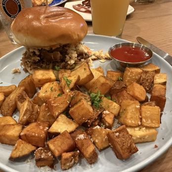 Cille And Scoe - Little Piggy pulled pork sandwich with cottage fries - Southern Near Me - Greensboro, North Carolina Cille And Scoe - Little Piggy pulled pork sandwich with cottage fries - Southern Near Me - Greensboro, North Carolina