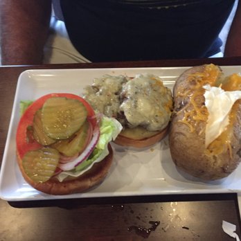 2 Creeks Bar & Grill - Two Creeks burger (two 4 oz patties) with large baked potato - Bars Near Me - St. Augustine, Florida