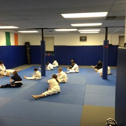 AllStar MMA of Warren - Kids stretching before class.