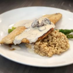 Cozymeal - Pan seared trout on risotto with asparagus  Photo ©Ed Wolkis