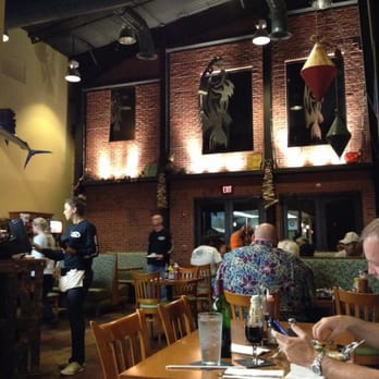 Tin Fish - Inside the Tin Fish. Casual atmosphere and friendly staff. - Seafood Near Me - Okeechobee, Florida Tin Fish - Inside the Tin Fish. Casual atmosphere and friendly staff. - Seafood Near Me - Okeechobee, Florida