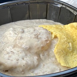 Biscuits and gravy with scrambled eggs. Biscuits and gravy with scrambled eggs.