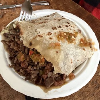 Tacos El Zurdo - This was 1/4 of the burrito. It engulfs the plate. - Tacos Near Me - Rosarito, BCN Tacos El Zurdo - This was 1/4 of the burrito. It engulfs the plate. - Tacos Near Me - Rosarito, BCN