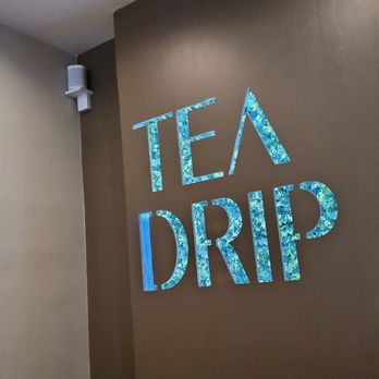 Tea Drip - The logo with one of the speakers. - Bubble Tea Near Me - Duluth, Georgia