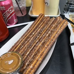 Churros, they look burnt but tasted pretty good. Would recommend!