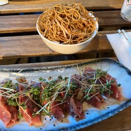 Pork dumplings and side of noodles