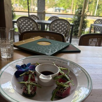 One Thirteen - Tuna with seared sesame , cucumber, bell beeper , soy sauce. Cute Flower accent - Mediterranean Near Me - Mandeville, Louisiana