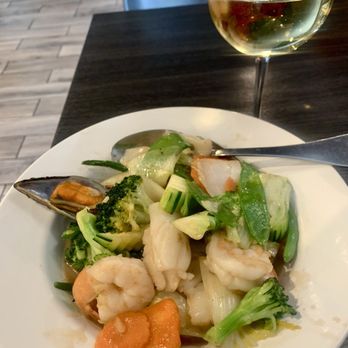 Five Sisters Thai Cuisine - Sandra's Vegetable Delight with Seafood and a glass of Chardonnay. - Thai Near Me - Renton, Washington Five Sisters Thai Cuisine - Sandra's Vegetable Delight with Seafood and a glass of Chardonnay. - Thai Near Me - Renton, Washington