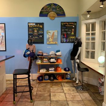 Surfing Monkey Shave Ice - a man and a woman in a barber shop - Ice Cream & Frozen Yogurt Near Me - Kihei, Hawaii
