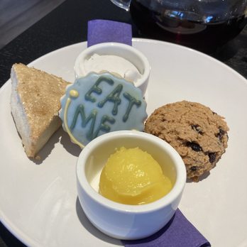 Drink Me! Tea Room - Vanilla scone, sugar cookie, fruit cake scone with coconut cream and lemon curd - Tea Rooms Near Me - Tempe, Arizona Drink Me! Tea Room - Vanilla scone, sugar cookie, fruit cake scone with coconut cream and lemon curd - Tea Rooms Near Me - Tempe, Arizona