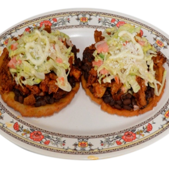 Taqueria Garibaldi - two tacos on a plate - Mexican Near Me - Hyattsville, Maryland Taqueria Garibaldi - two tacos on a plate - Mexican Near Me - Hyattsville, Maryland