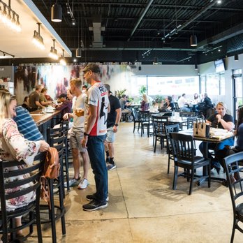 Sapwood Cellars Brewery - people sitting at the bar - Breweries Near Me - Columbia, Maryland Sapwood Cellars Brewery - people sitting at the bar - Breweries Near Me - Columbia, Maryland