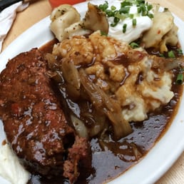 Meatloaf, mashed potatoes, perogies with sourcream and onion