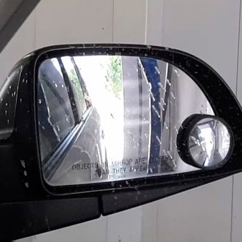 Shell - The robotic wash arm approaches spraying product onto the car! - Car Wash Near Me - Anaheim, California