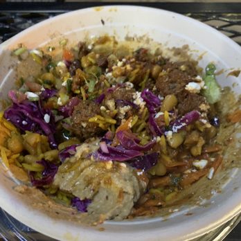 Zoa Moroccan Kitchen - Half eaten custom bowl with everything! My goodness it was heaven! - Moroccan Near Me - Houston, Texas