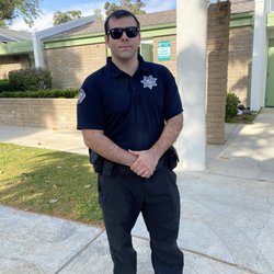 PAX Security and Investigations - Pax Investigations and Security Group security guard.