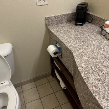Comfort Inn & Suites - In-bathroom coffee station next to toilet. - Hotels Near Me - Riverton, Wyoming