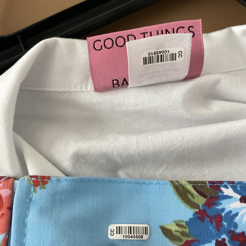 NEVER put permanent adhesive on a garment without permission and certainly don't gaslight the customer for complaining.