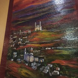 Ixtapa Mexican Restaurant - Nice art next to tables.