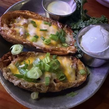 Cattlemens - Loaded Potato Skins Six large potato skins, seasoned and loaded with sharp cheddar cheese and applewood smoked bacon - Seafood Near Me - Dixon, California Cattlemens - Loaded Potato Skins Six large potato skins, seasoned and loaded with sharp cheddar cheese and applewood smoked bacon - Seafood Near Me - Dixon, California