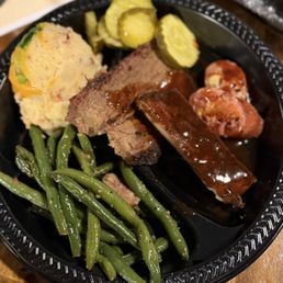 Sliced Brisket, Pork Ribs, Pablano Pepperjack Sausage with Green Beans and Loaded Mashed Potatoes Sliced Brisket, Pork Ribs, Pablano Pepperjack Sausage with Green Beans and Loaded Mashed Potatoes