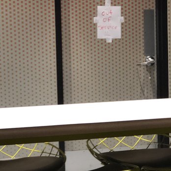 McDonald's - a table and chairs in a restaurant - Fast Food Near Me - New York, New York