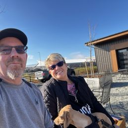 Kicking back by the fire pit with our puppies