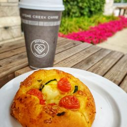 Vegetable ricotta bun and white mocha Vegetable ricotta bun and white mocha